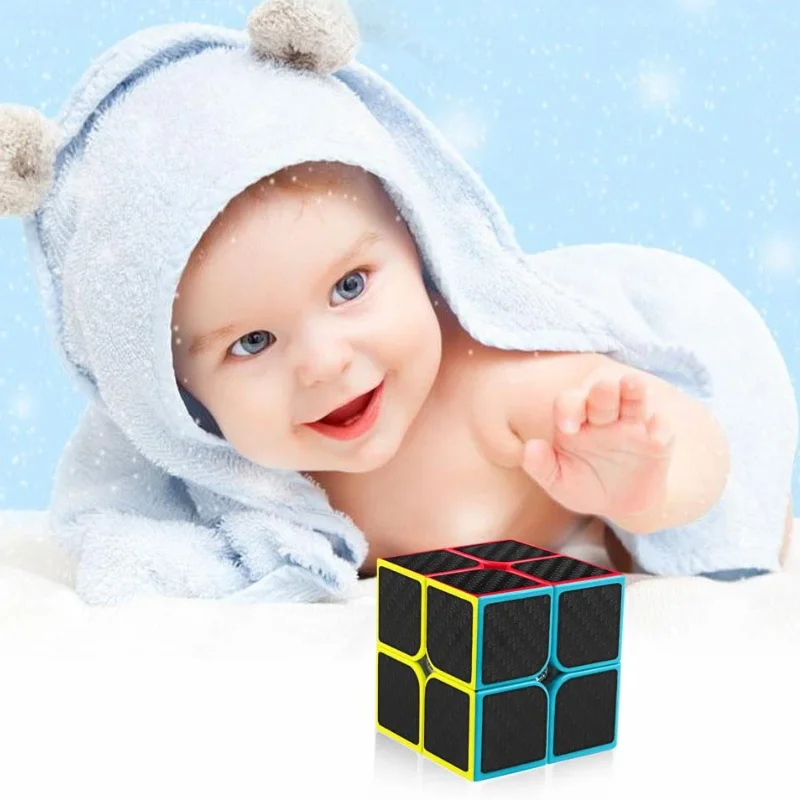 Child playing with a carbon fiber 2x2 cube demonstrating tactile engagement and pocket portability