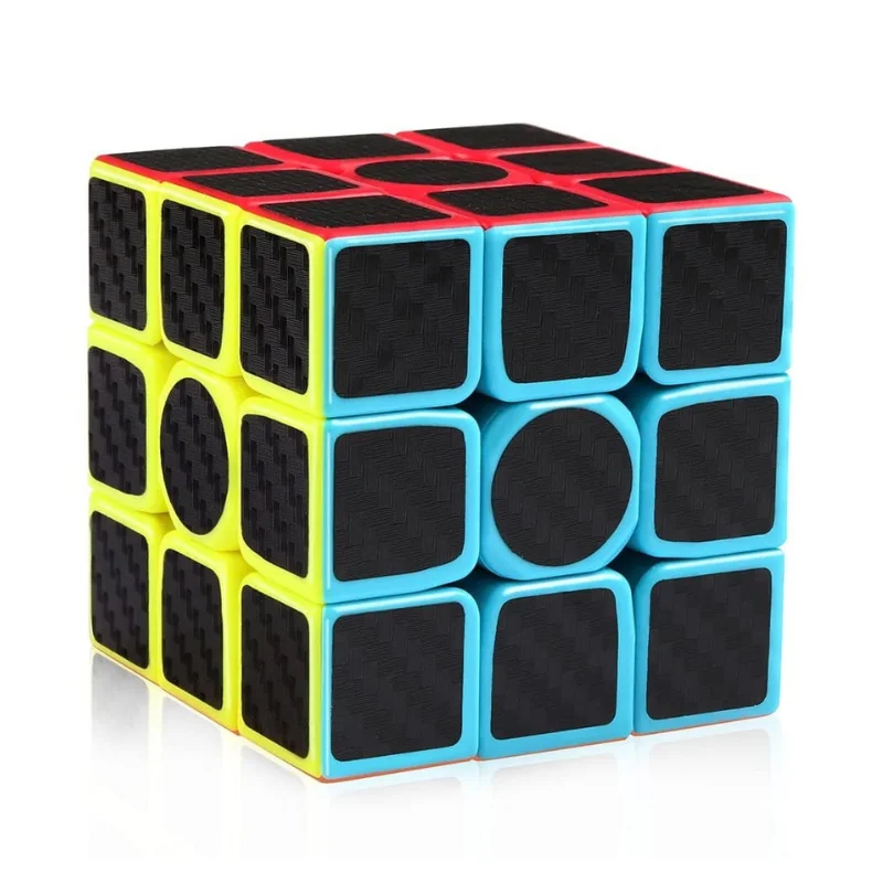 Front hero view of a carbon fiber 3x3 cube showing circular center caps and textured sticker layout