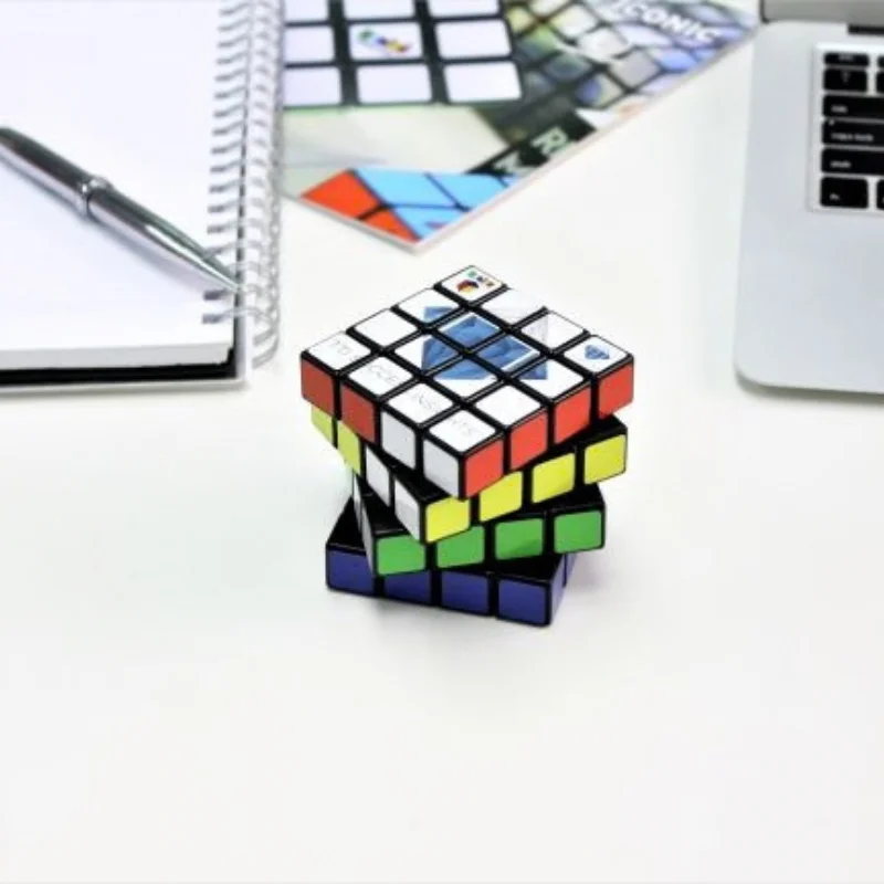 Custom 4x4 rubiks cube displayed on a modern corporate desk demonstrating standard 64mm size