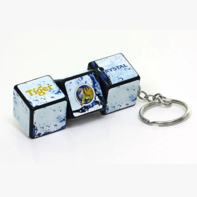 Custom folding block keychain featuring corporate automotive branding and multi-panel logo layouts