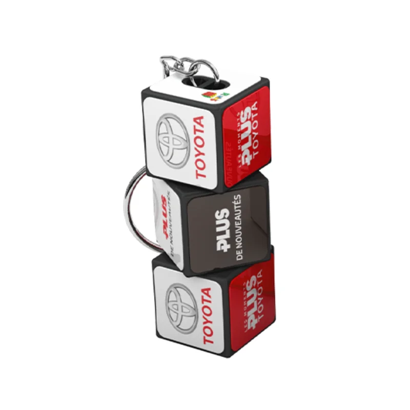 Custom folding block keychain displayed with individual retail presentation packaging and gift boxes