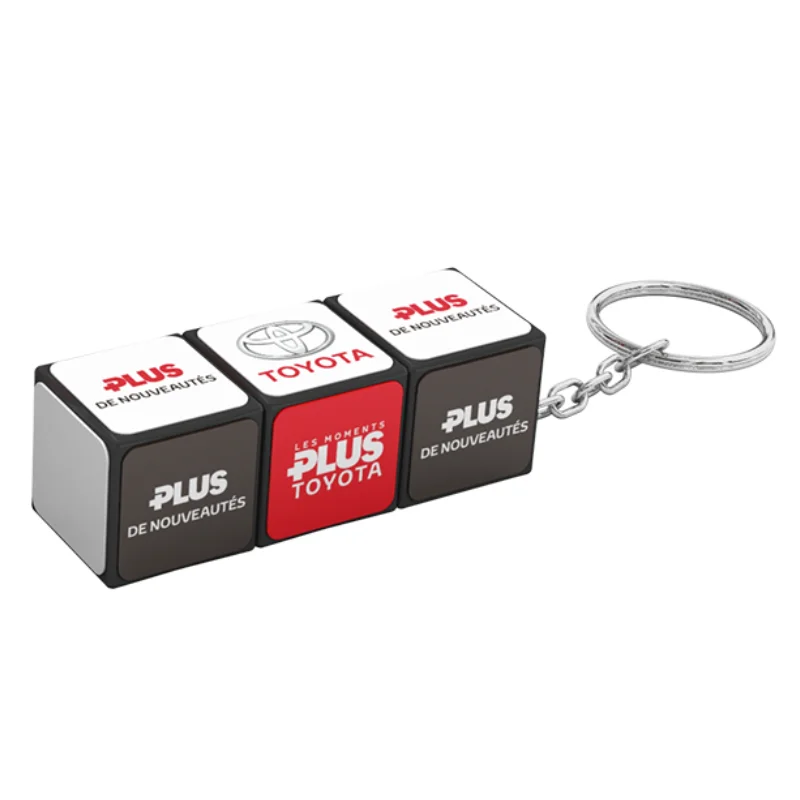 Multi-segment view of a custom folding block keychain displaying continuous logo graphics across folding panels