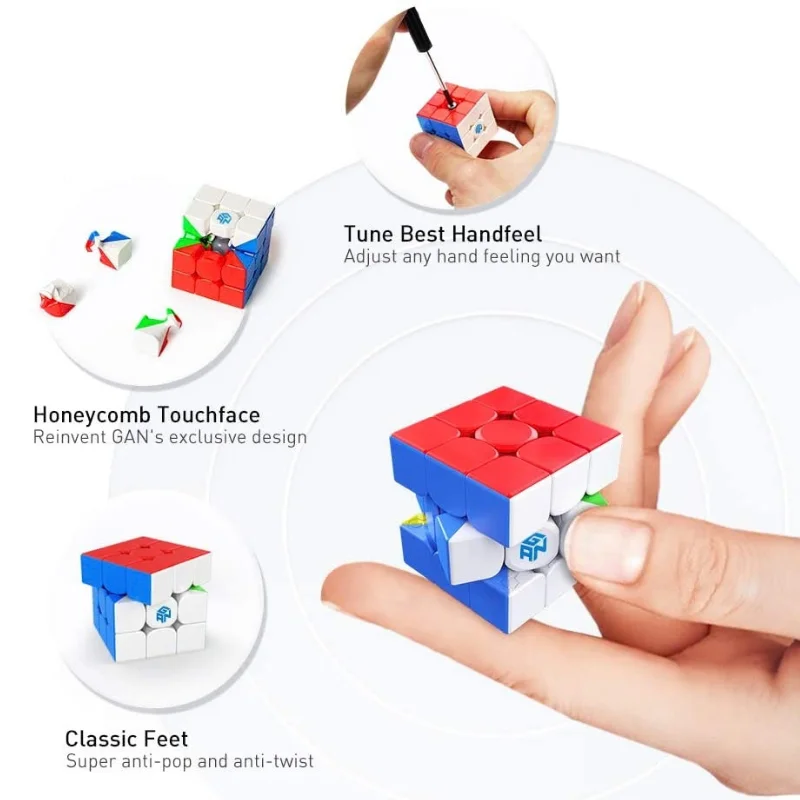 Person holding a custom mini rubiks cube keychain demonstrating compact size and metal ring attachment