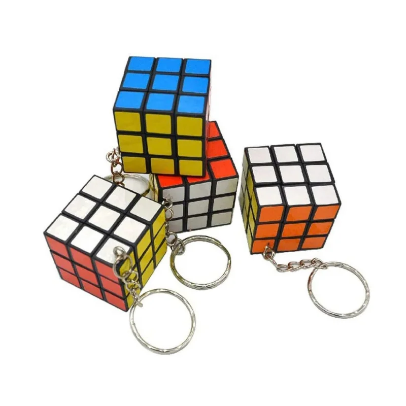 Custom mini rubiks cube keychain hero view showing multiple colorful mini puzzle keyrings on a clean surface