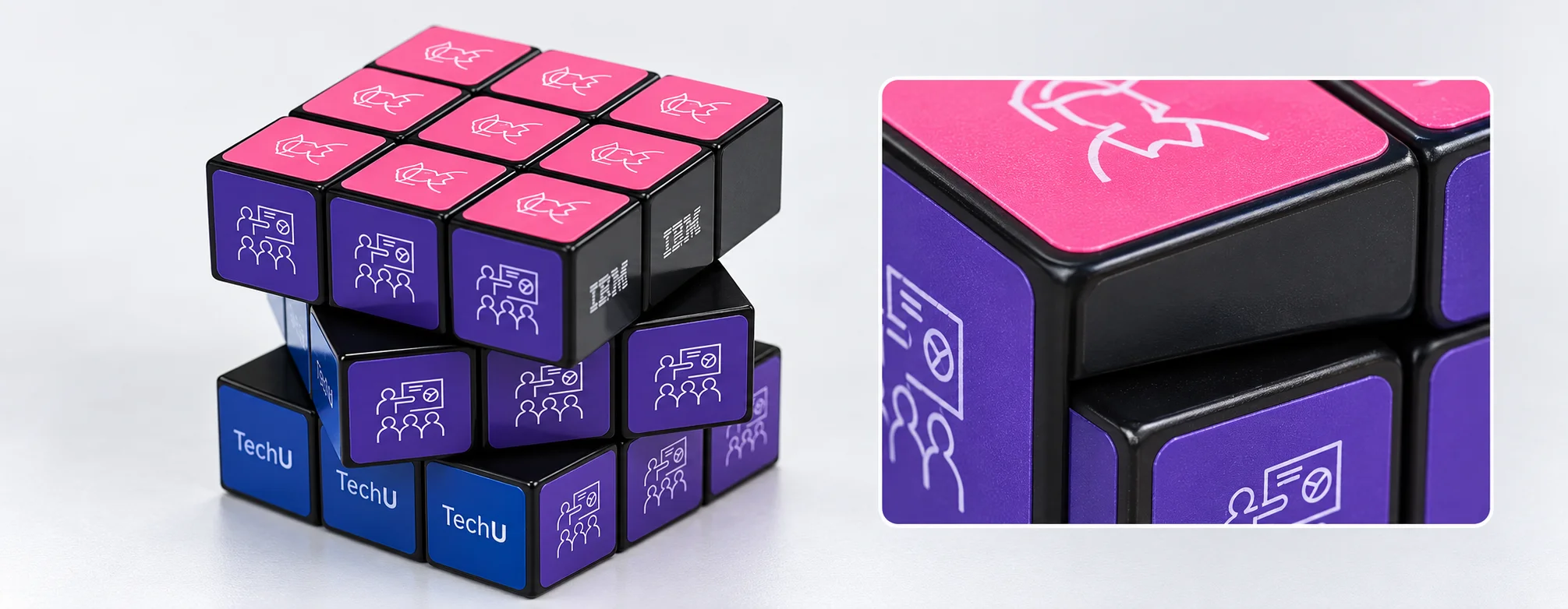 Wide introduction banner showing a custom promotional 3x3 rubiks cube on a modern corporate desk 