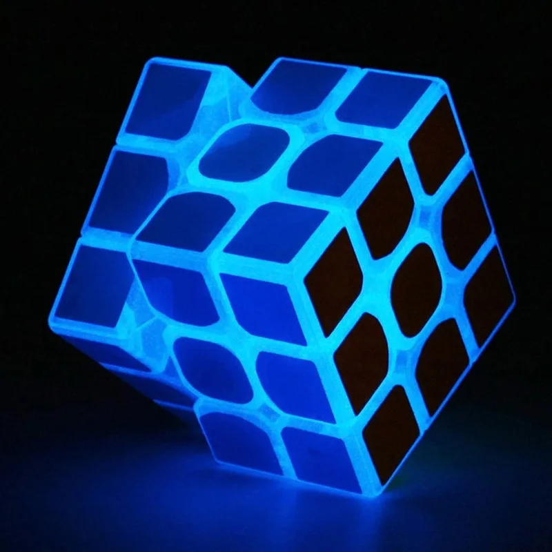 Luminous glow in the dark rubiks cube 3x3 emitting a brilliant blue fluorescent glow in dark conditions
