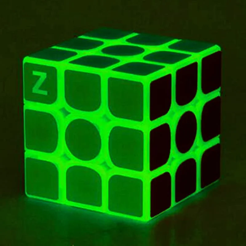 Luminous glow in the dark rubiks cube 3x3 emitting a bright green fluorescent glow in dark conditions