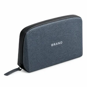 Closed blue-gray polyester cable organizer with white lettering, black edging and a zipper pull tab.