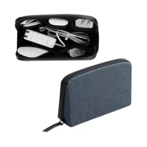 Open cable organizer containing small electronic accessories above a closed blue-gray pouch