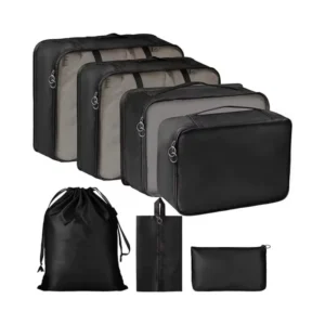 Black packing set with four rectangular organizers, a drawstring bag, a handled bag and a small pouch