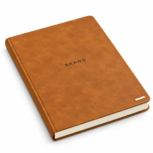 Tan A5 hardcover journal with textured PU cover shown at a three-quarter angle