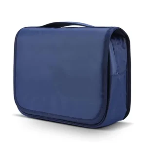 Closed navy toiletry organizer with a rectangular front flap, rounded corners and top handle
