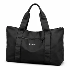 Black foldable nylon duffel bag with twin carry handles and a front zipper pocket on a white background.